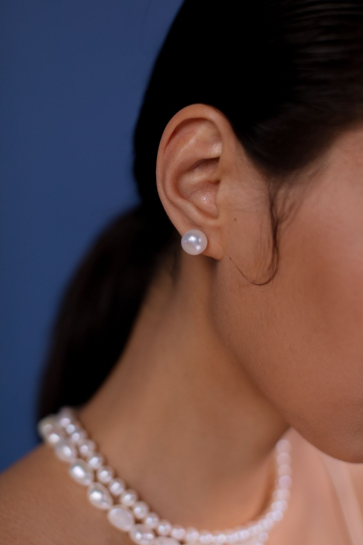 Woman wearing pearl jewellery